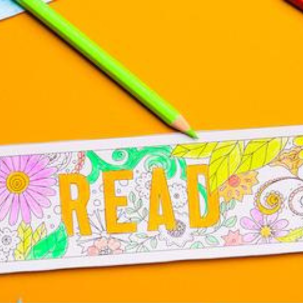 Bookmark with the word "READ" and color pencils on an orange background. "Culture Crawl" is written below in gold-font with black background