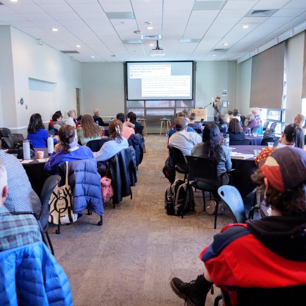 Audience from Cox event in round tables
