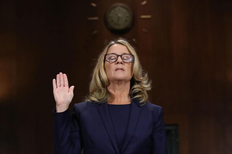 Ford testifying left hand up