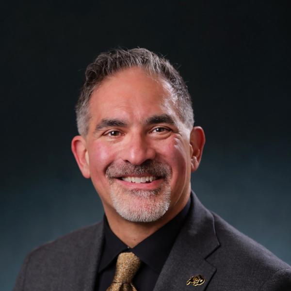 Justin Schwartz in suit and tie