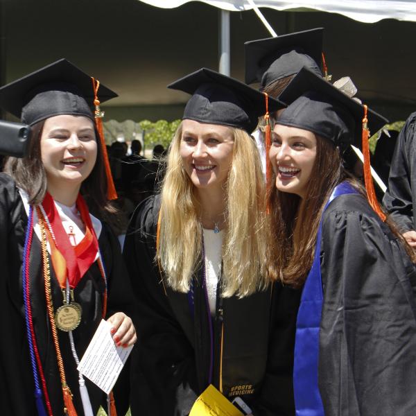 Students take a selfie during the processional.