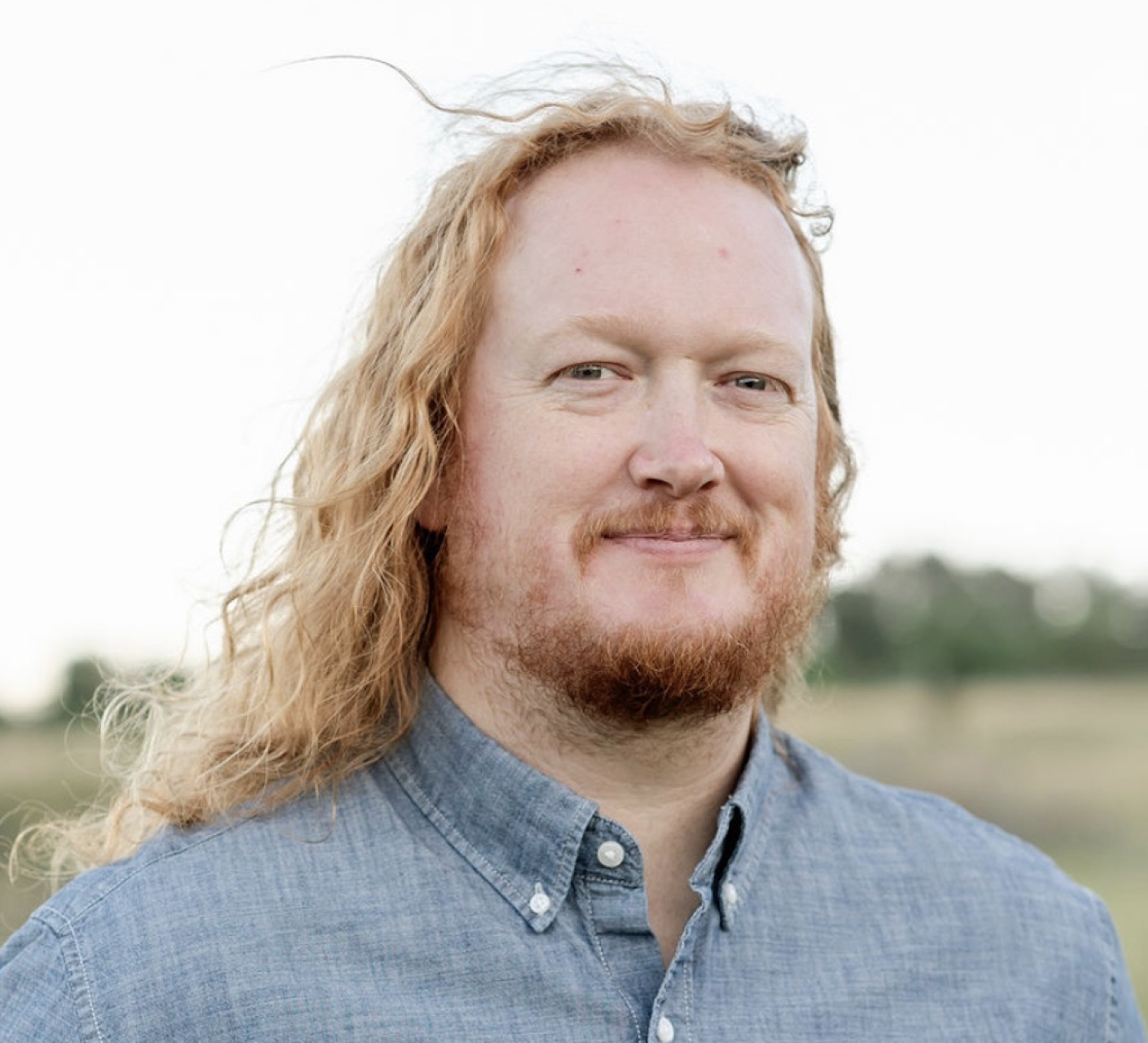 Wilson Smith in a button-down shirt.