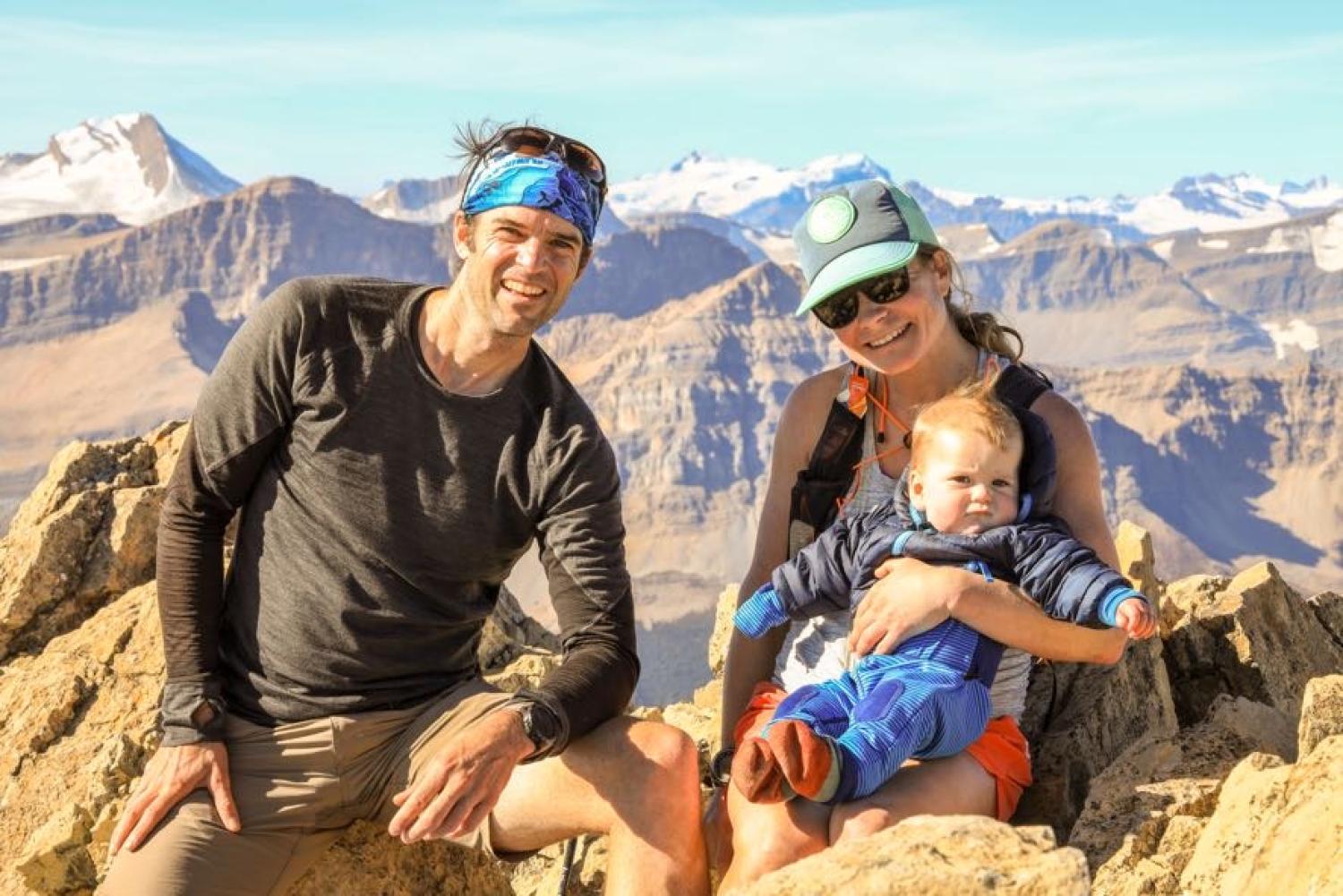 Charlie and family on top of a mountain.