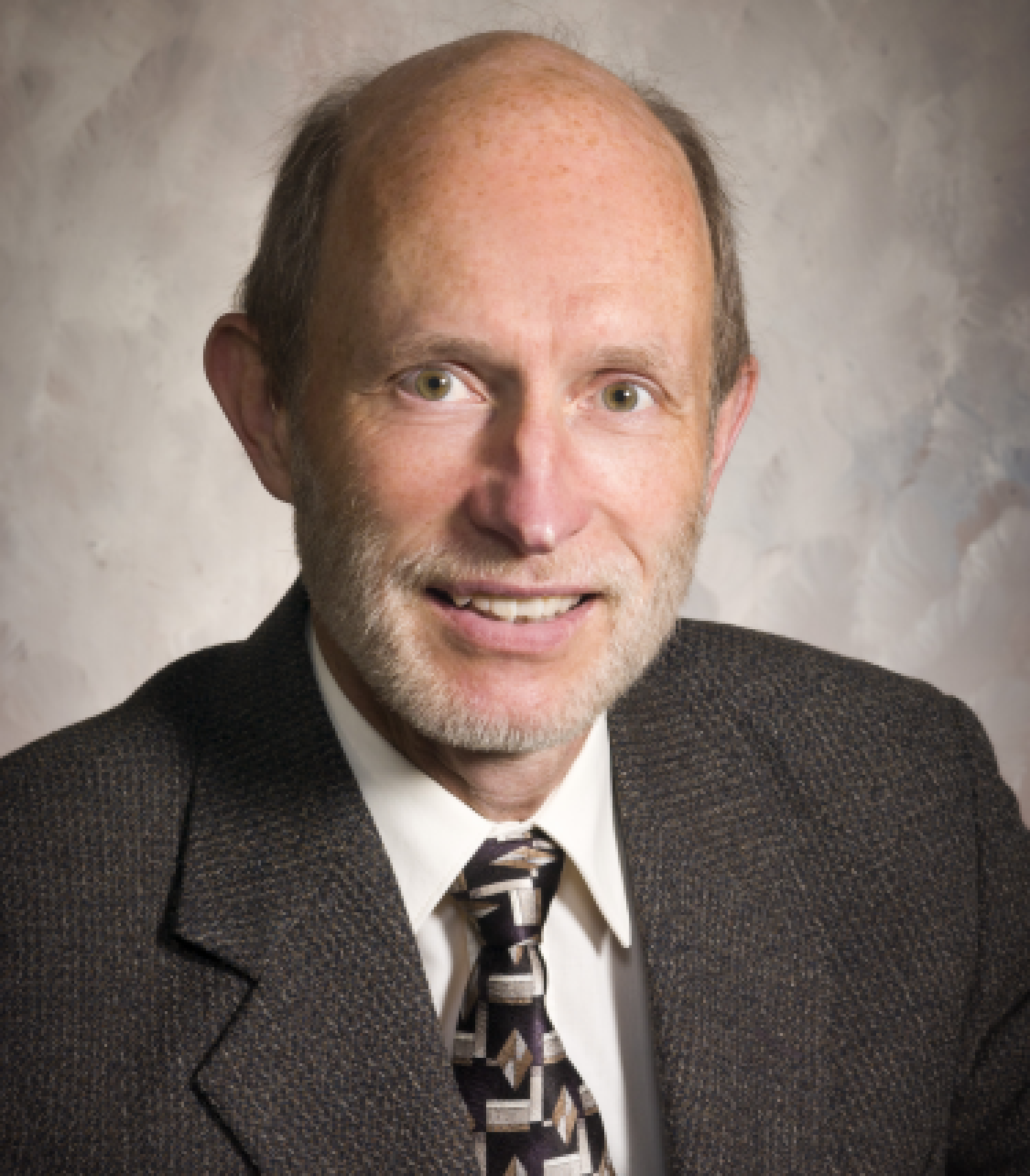 Portrait of Mark Strobel in sport coat and tie