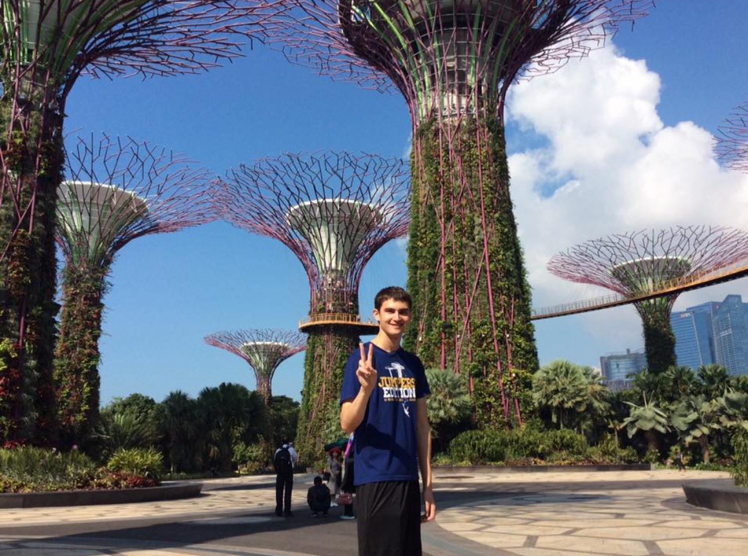 Ku Thomas stands in gardens in Singapore