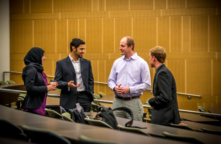 Students talk with an industry client