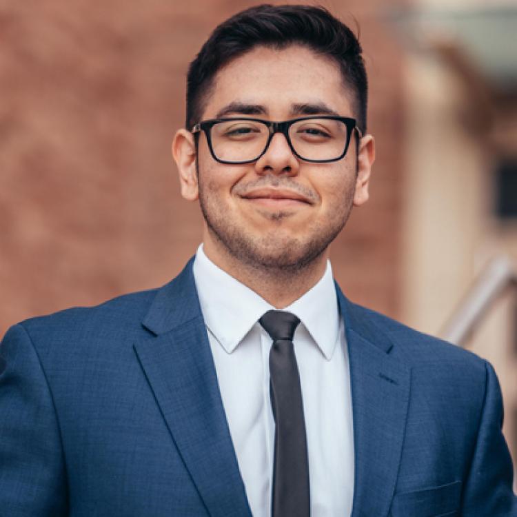 Marvin Gonzalez in blue suit