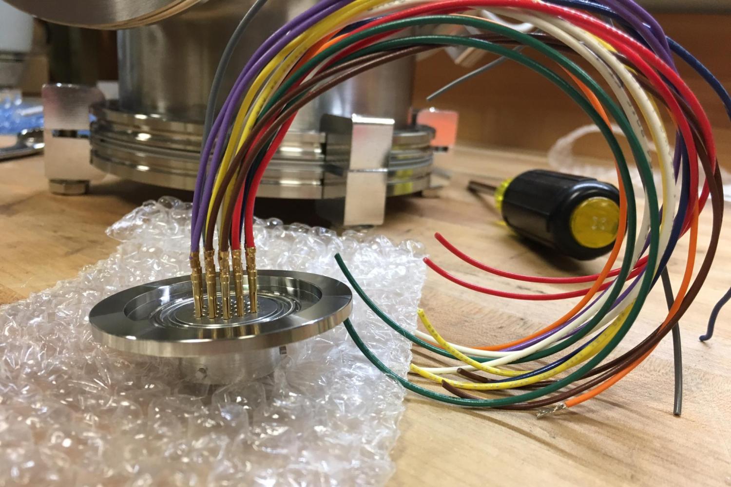 Multicolored wires on a table
