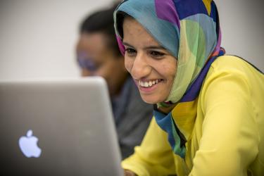 Student works on computer.