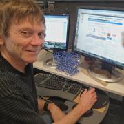 Professor John Falconer working on the learncheme.com website. 