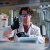 Cooper Thome, a doctoral candidate in the Department of Chemical and Biological Engineering, uses a new "acoustic pipette," which could someday be used to deliver swift test results at the bedside with only a finger-prick of blood.