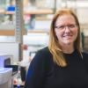 Kristi Anseth with her lab blurred in the background