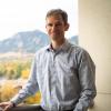Will Medlin on balcony overlooking Boulder