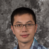Jiajie Huo in plaid blue and grey shirt