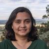 Nabilia Tanjeem in green shirt standing outside