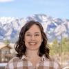 Nicole Day in front of blurred mountains