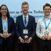 Annika Lai, Theodore Champ and Peter Buur stand with their poster awards at AIChE conference