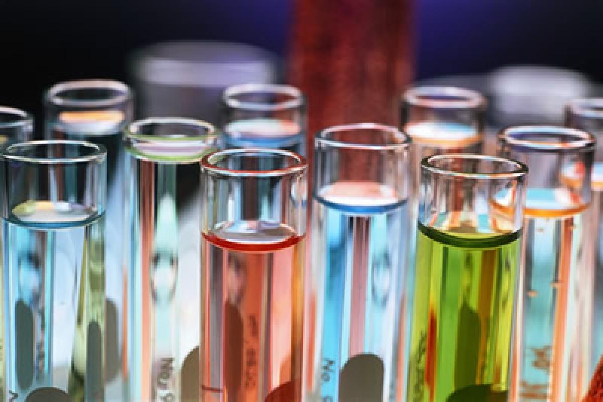 Test tubes with fluorescent liquids