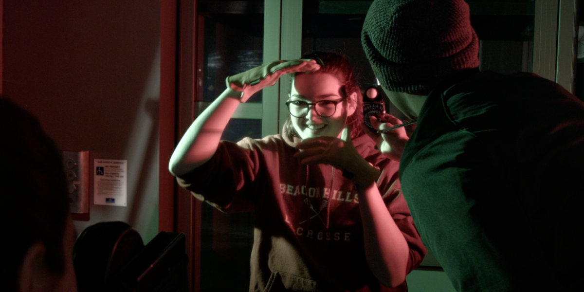 Student framing her face with her hands