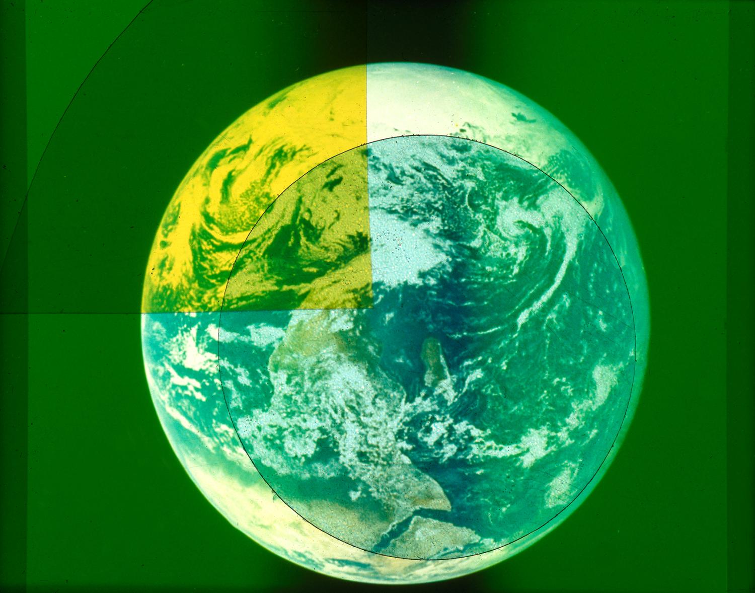 Image of the planet earth from from Jeanne Liotta, “My Mind of Universes Erupting Continuously,” 2021, 80 looping handmade 35mm slide projection installation