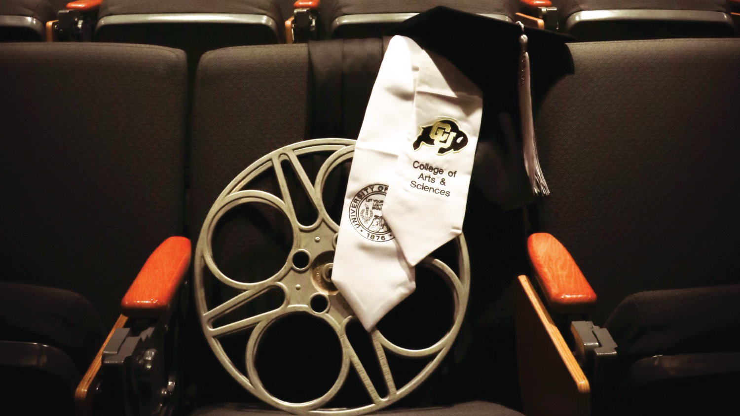 reel with grad cap