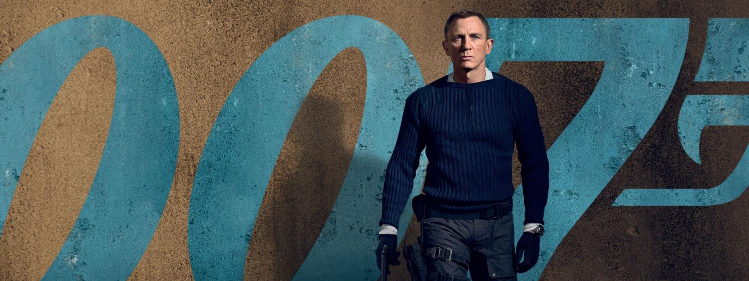 Daniel Craig as James Bond in front of the blue 007 logo