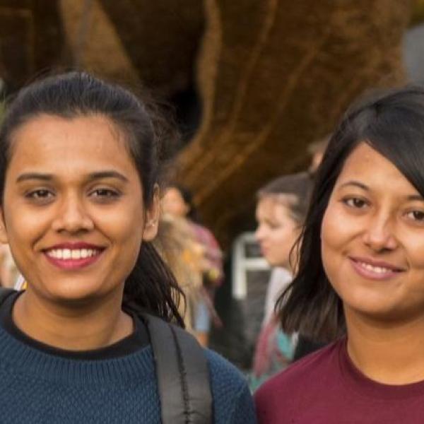 Three women smiling