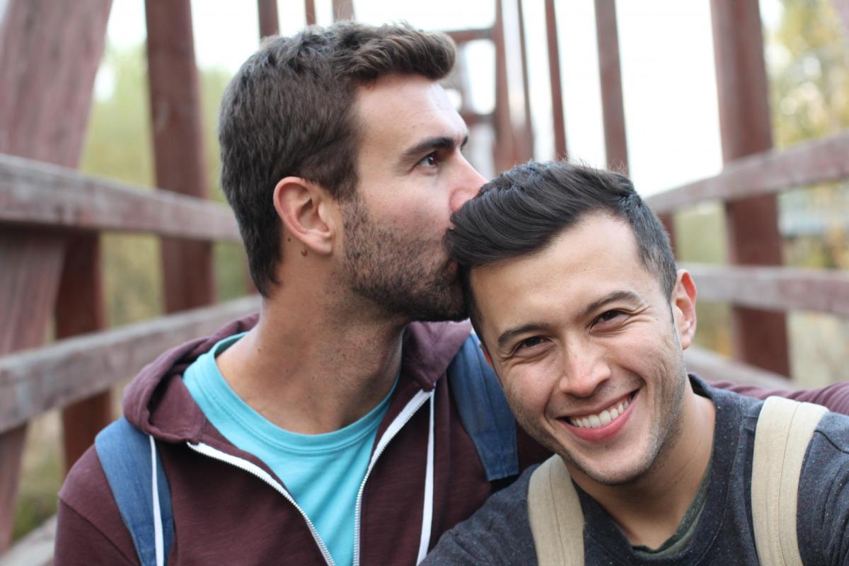 Couple embracing and smiling