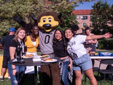 Students with Chip, the mascot, at CUnity Fest on campus