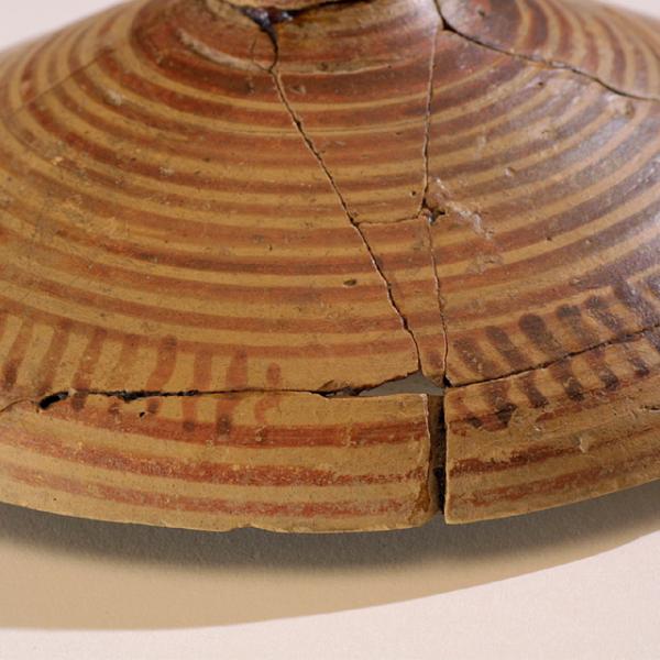 detail of banded patterning on lid