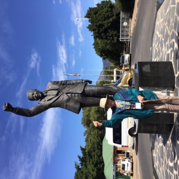 Joy King in front of the statue of Nelson Mandela in Johannesburg