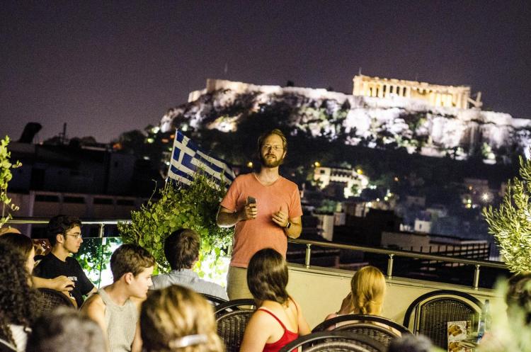 Jason Pedicone speaking to a group of students in Greece