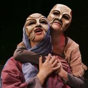 Picture of two actors rehersing the Hecuba play with costumes and masks