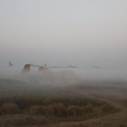 Hermopolis covered in mist