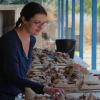 Sarah James at work on pottery at Corinth