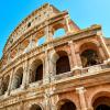 Picture of the Roman Colosseum against a blue sky