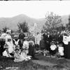 Historic photo of family at gravesite