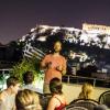 Jason Pedicone speaking to a group of students in Greece