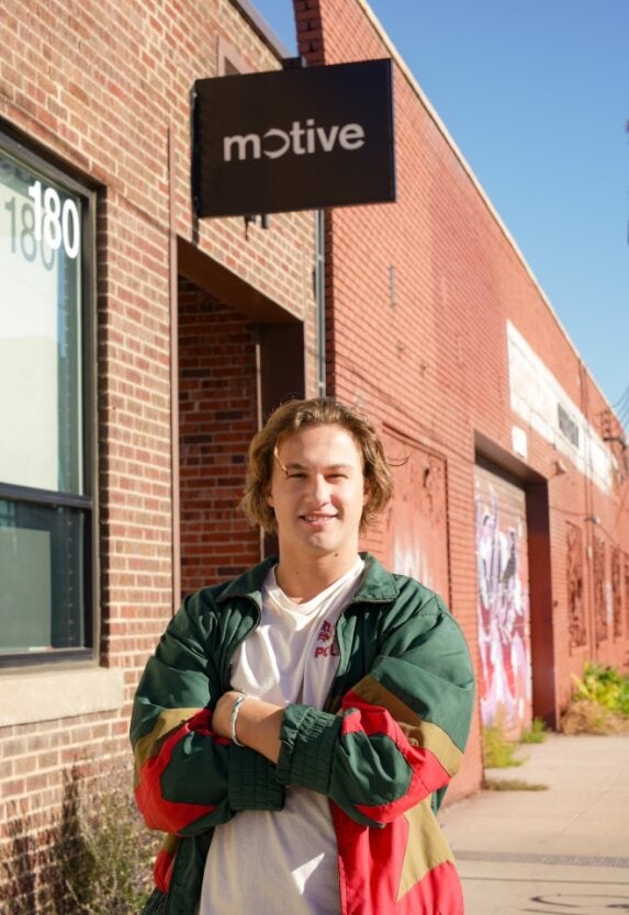 Enzo outside the Motive office.