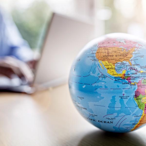 Globe with computer