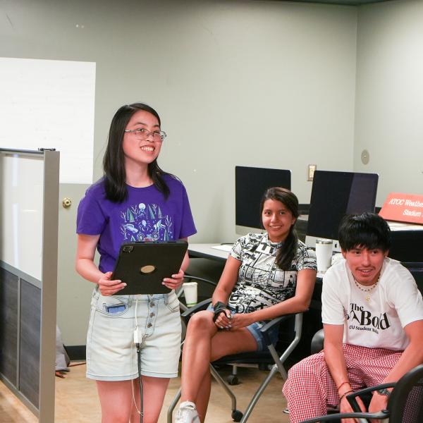 Pathways student Amy Kibort uses an iPad to test out augmented reality software.