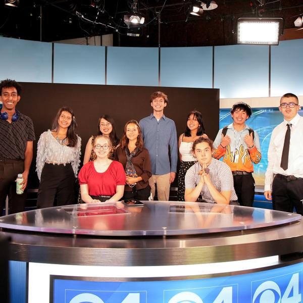 Pathways students pose for a photo at the CBS4 news desk.