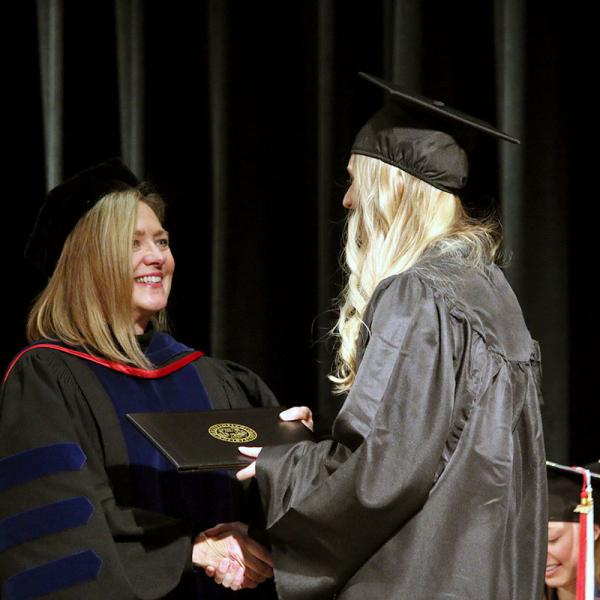 Graduates receive their degrees.
