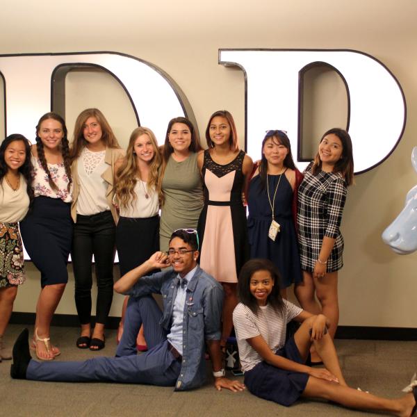 Students then headed to Denver to take tours of some of the area's biggest news outlets. Here, students pose in the lobby of the Denver Post's downtown office.