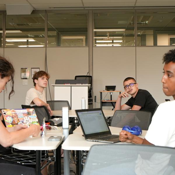 A group of incoming CMCI students work together in their Public Speaking class during the 2022 Pathways summer intensive program.