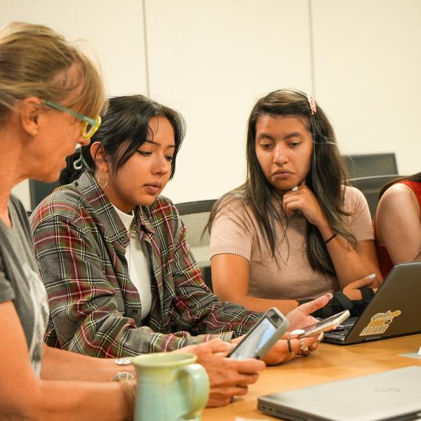 Pathways student Camila Gutierrez teaches the class how to make a TikTok video in their Writing and Rhetoric class taught by Laurie Gries, an associate professor in communication.