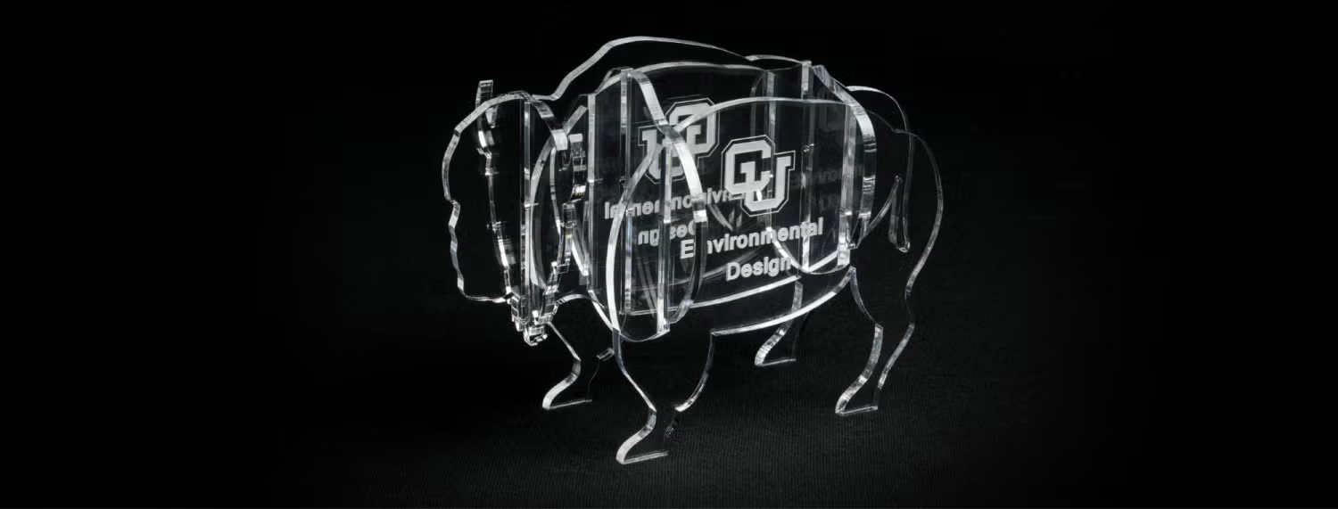 ENVD alumni award figure, glass buffalo