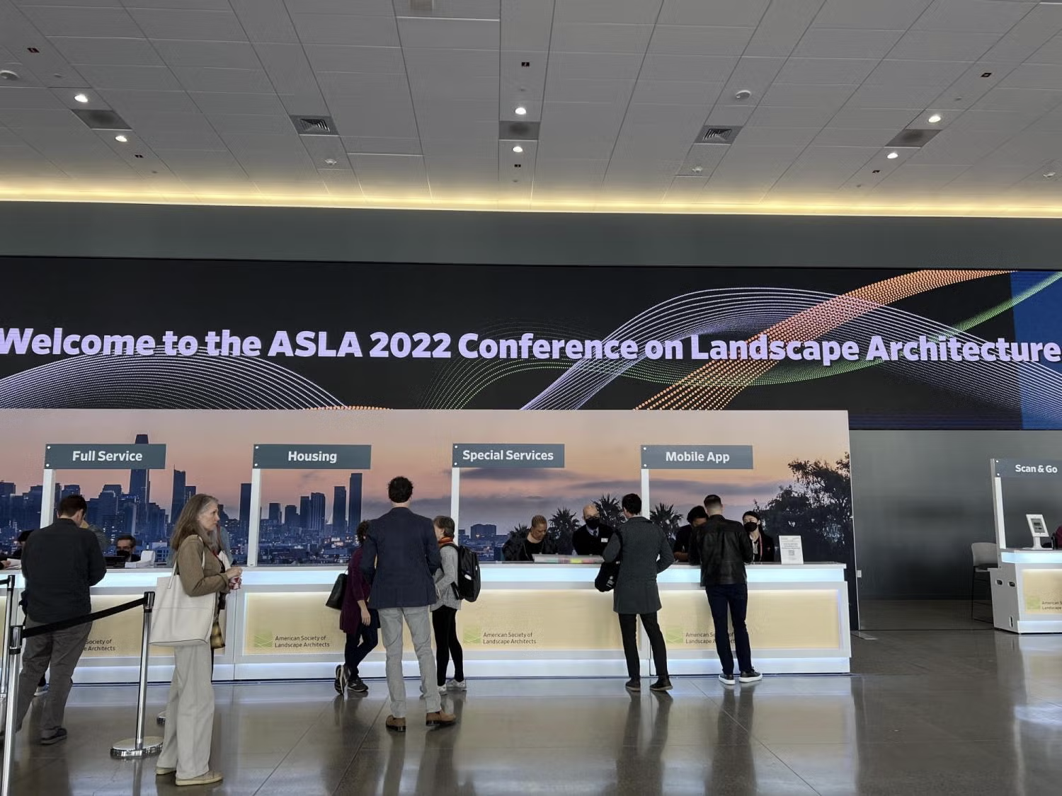 ASLA welcome screen above the check in desk