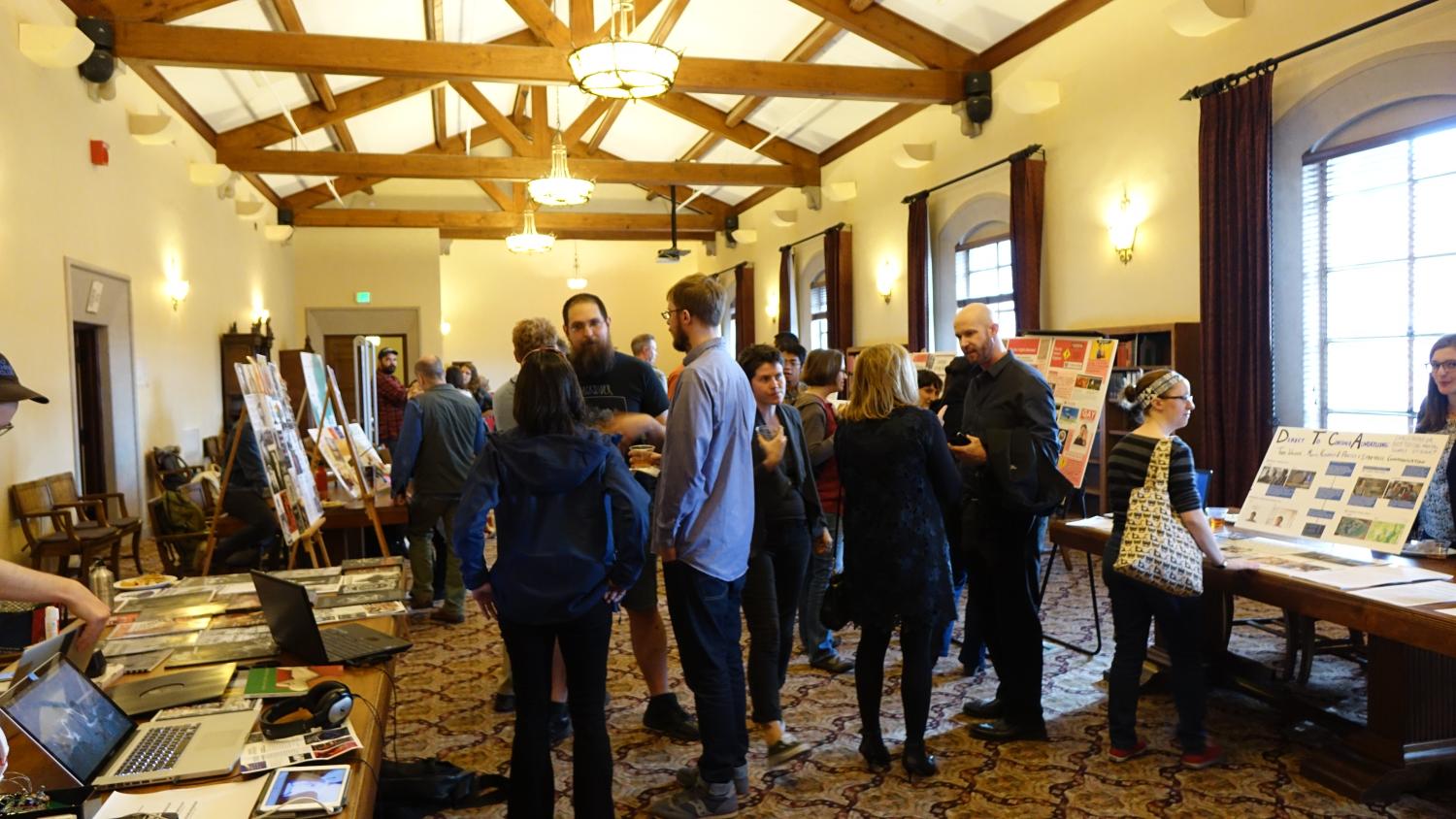 Graduate students gathered with peers, staff and faculty members Friday to share research projects during the graduate research and creative practice fair in Norlin Library.