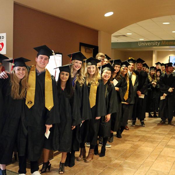 Graduates line up for the ceremony.